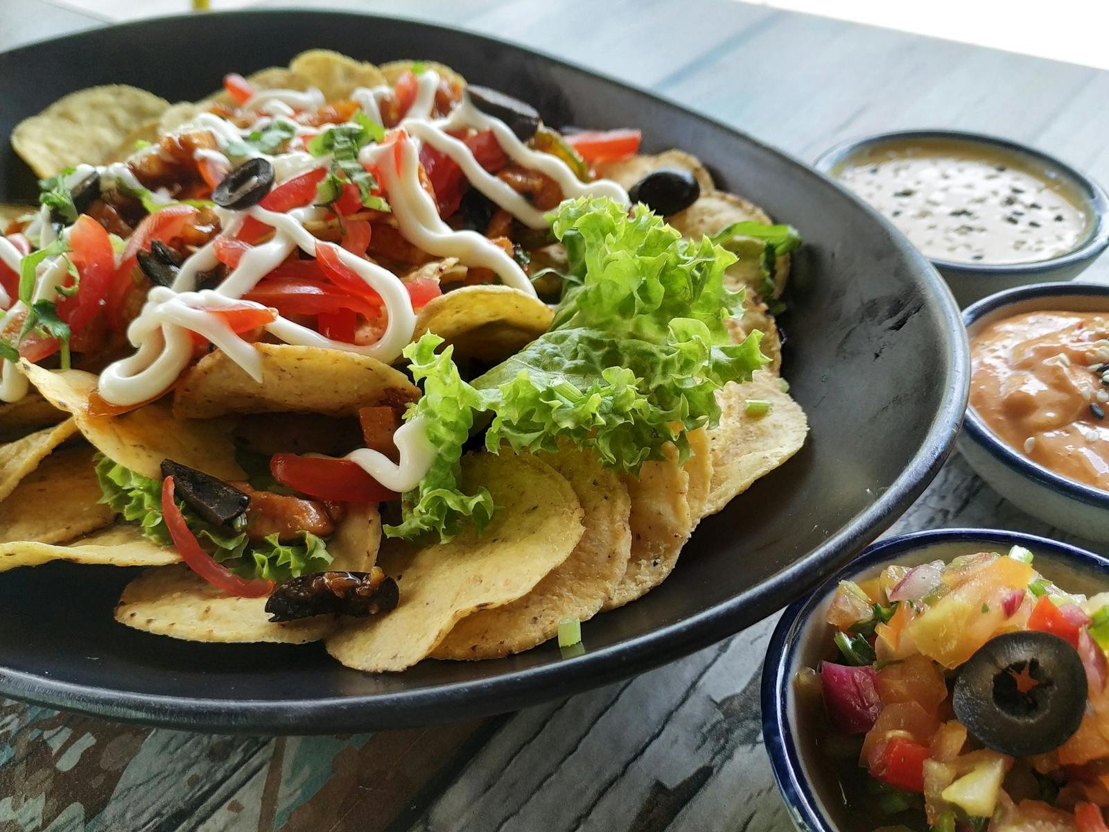 Mouth-watering nachos with fresh salsa, cheese, and delicious toppings. Perfect for appetizers or snacks.